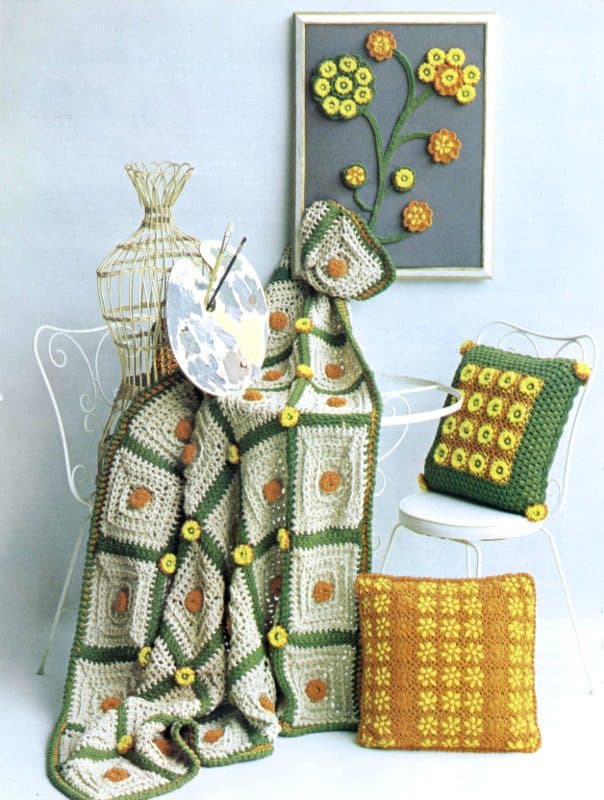 Crocheted Afghan with Daisy Trim, shown with the wall hanging and pillows, from the original book