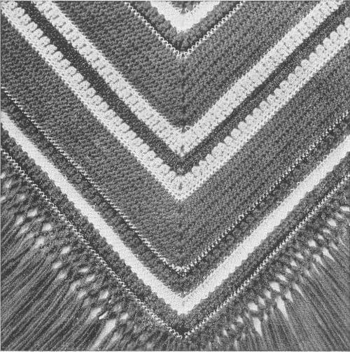 Close-up of the Square Dance design with knotted fringe, from the original book